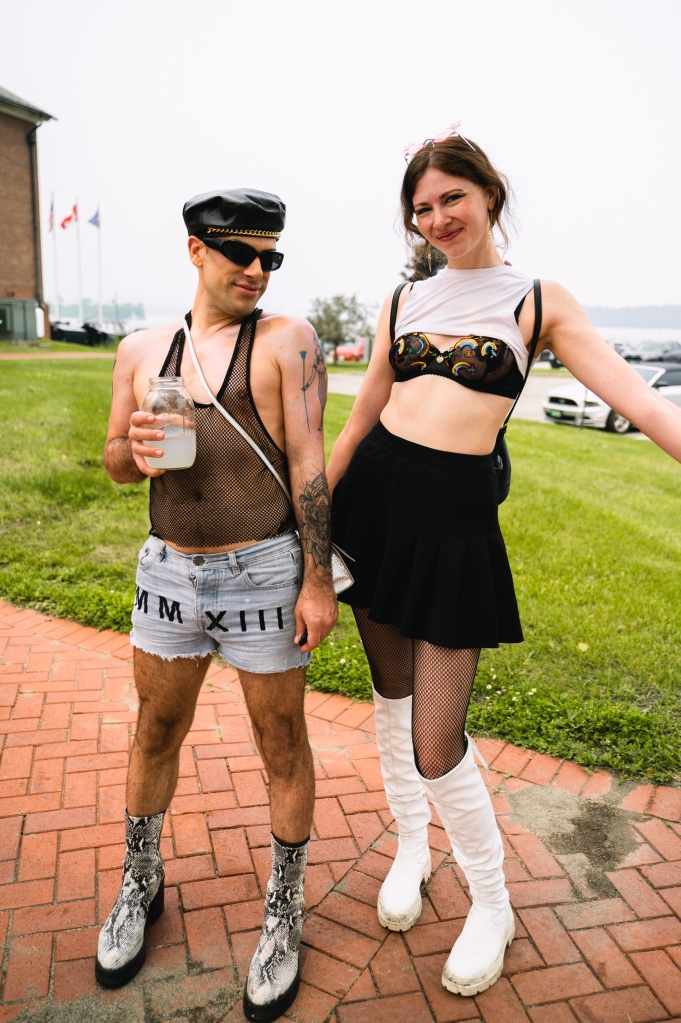 Two people dressed up for Pride